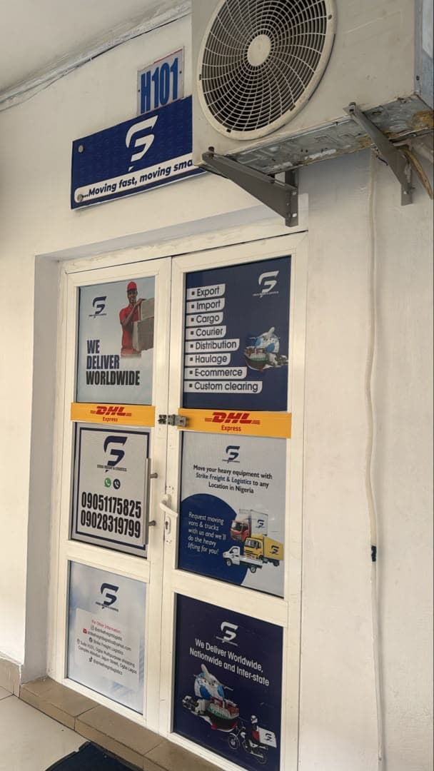 Strike Freight & Logistics office entrance at Suite H101, Ogba Central Mall, Ogba, Lagos