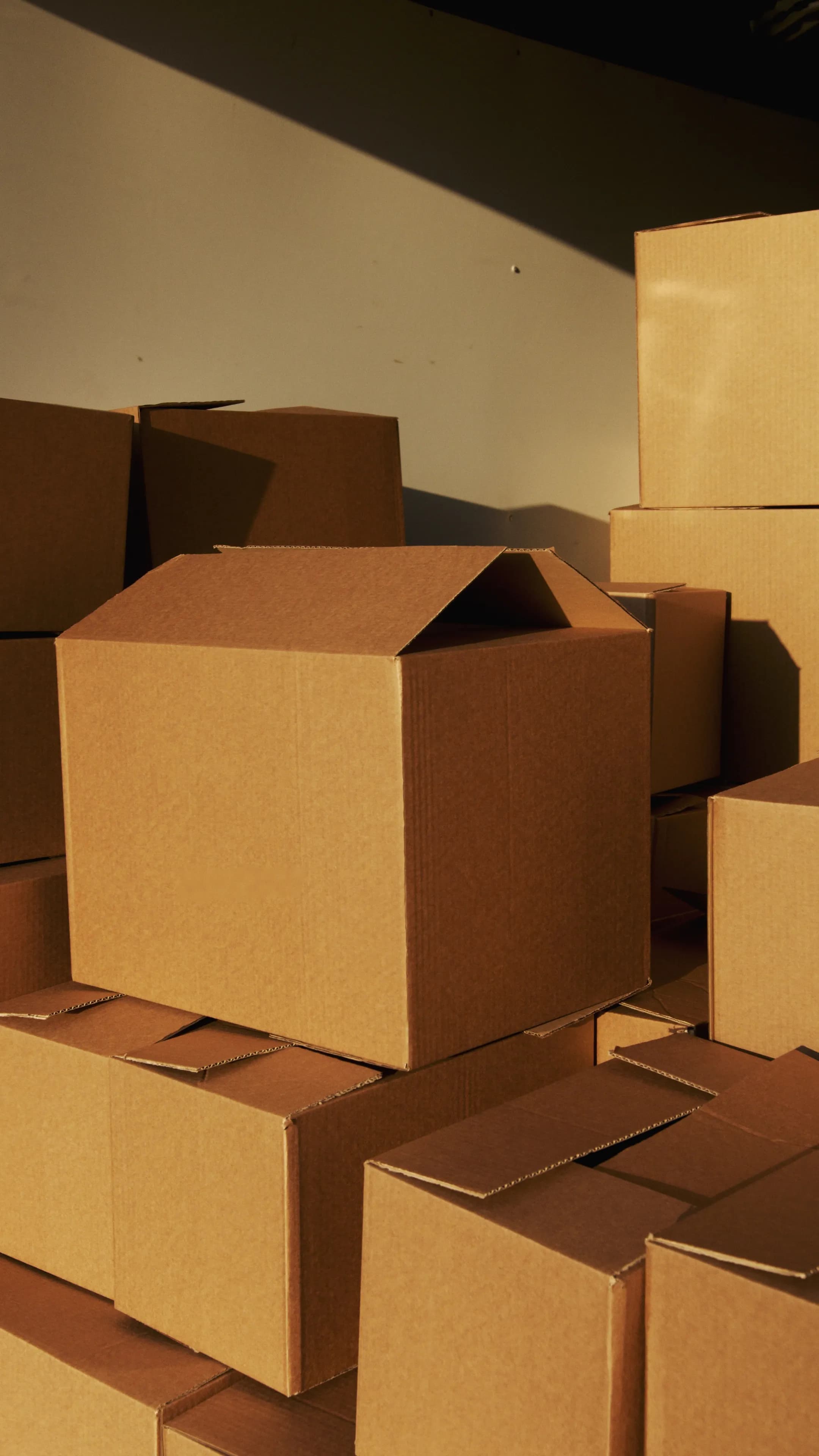 Cardboard boxes packed and labelled for international shipping from Lagos, Nigeria